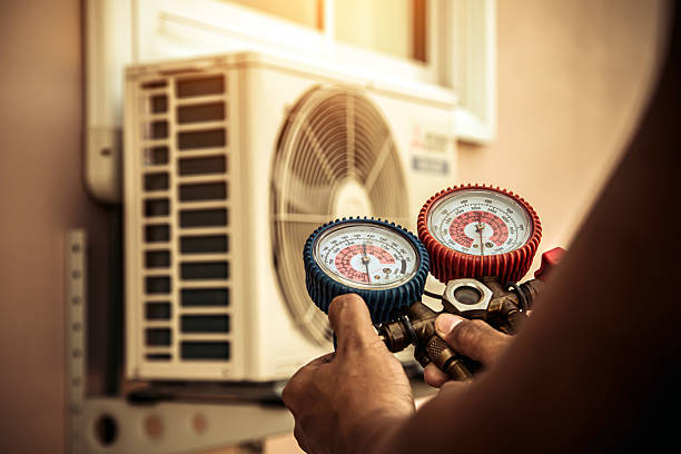 Professional Air Conditioning Service technician working in Fairfax, MN